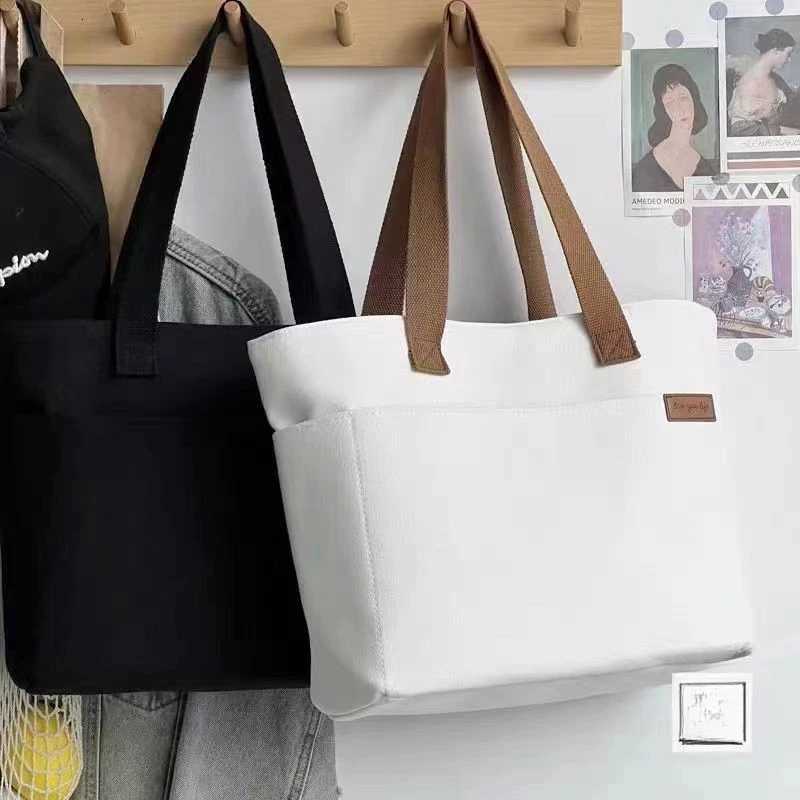 100% Authentic Product Brand New High Quality Fashionable Versatile Minimalist Womens Tote Bag Unisex Large Capacity Portable Canvas Handbag G250729