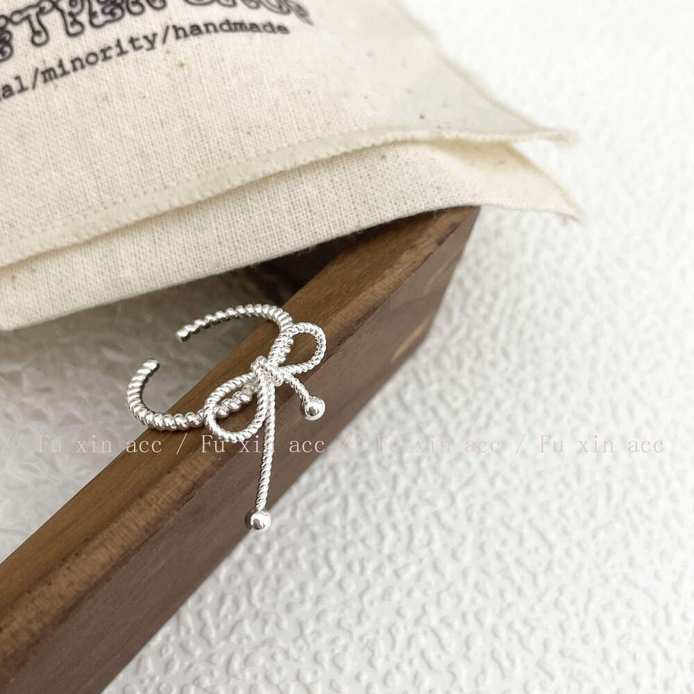 Korean Version Light Luxury Niche Design High-End Twist Asymmetric Bowknot Sweet Open Adjustable Ring 9d0