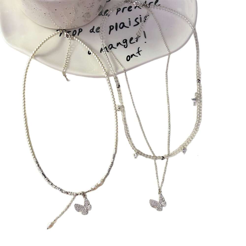 Fashion Simple Broken Sier Pearl Butterfly Tassel Pendant Crystal Beaded Necklace Niche Light Design Sense Collarbone Chain 3c1