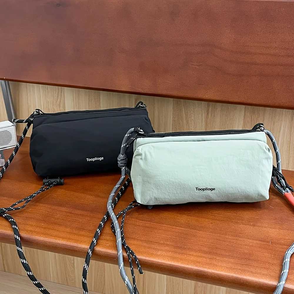 Ins Fashion Brand Crossbody Bag Female Niche Design Sense Shoulder Bag Fashion Commuter Backpack Female Portable Phone Bag G250729