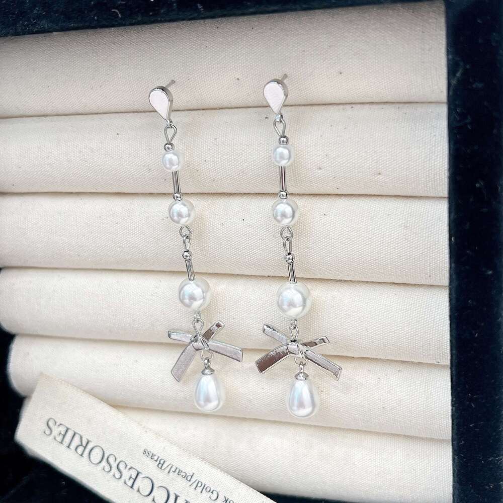 Simple Elegant Exquisite High-end Pearl Long Style Light Niche Bow Sweet Earrings 590