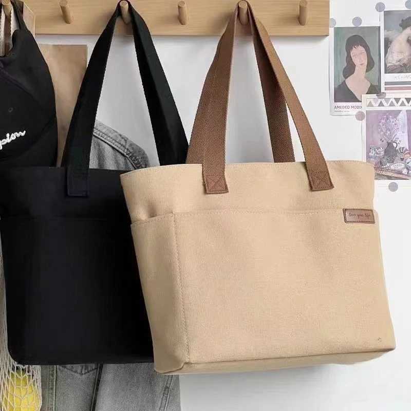 100% Authentic Product Brand New High Quality Fashionable Versatile Minimalist Womens Tote Bag Unisex Large Capacity Portable Canvas Handbag G250729