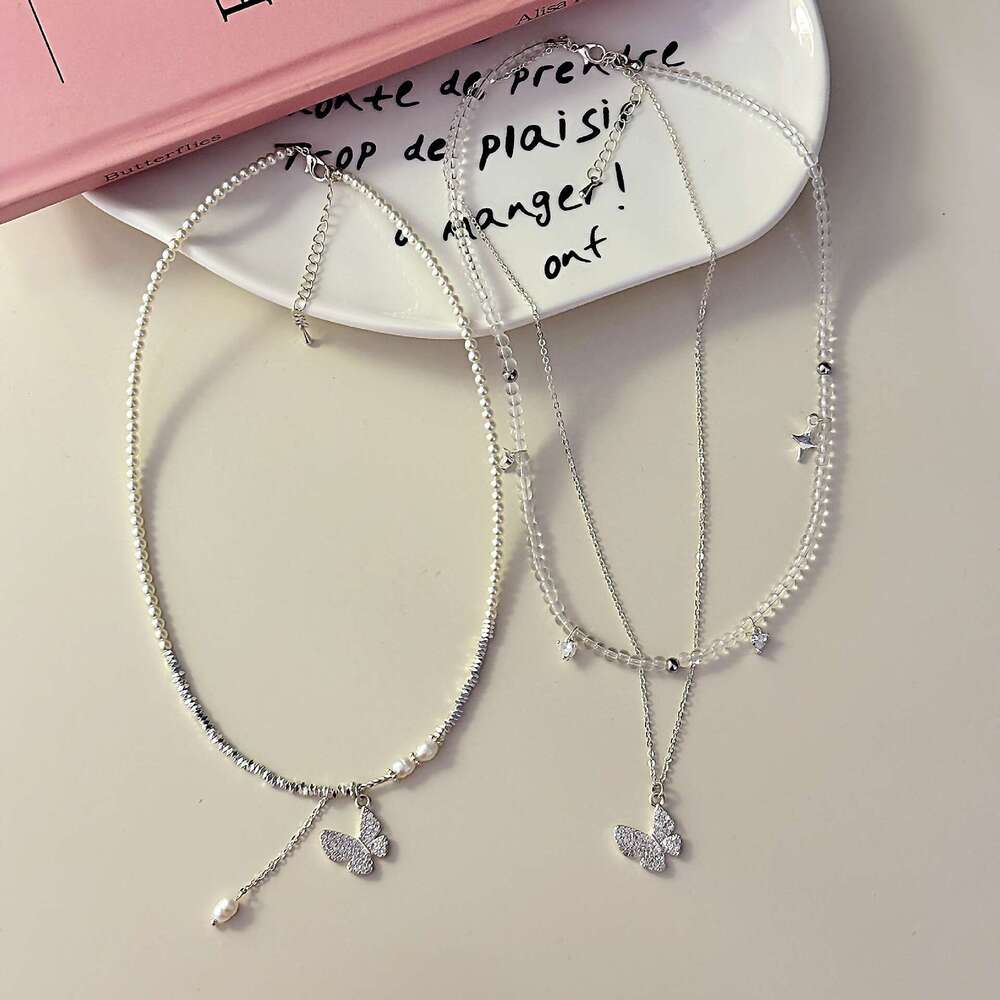 Fashion Simple Broken Sier Pearl Butterfly Tassel Pendant Crystal Beaded Necklace Niche Light Design Sense Collarbone Chain 3c1