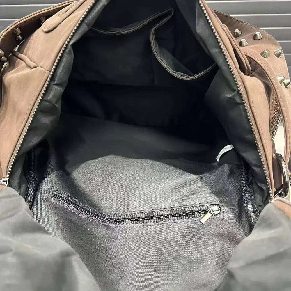 Ladies' Fashionable Frosted Vegan Leather With Large Capacity, Multiple Zippers, Rivets, And A Single Shoulder Bag