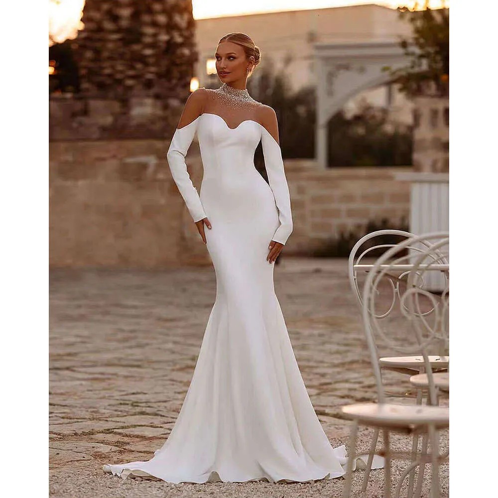 Luxury Saudi Arabic Wedding Dresses Long Sleeves High Neck Dubai Crystal Beaded Lace Bridal Gowns Vestido de Novia