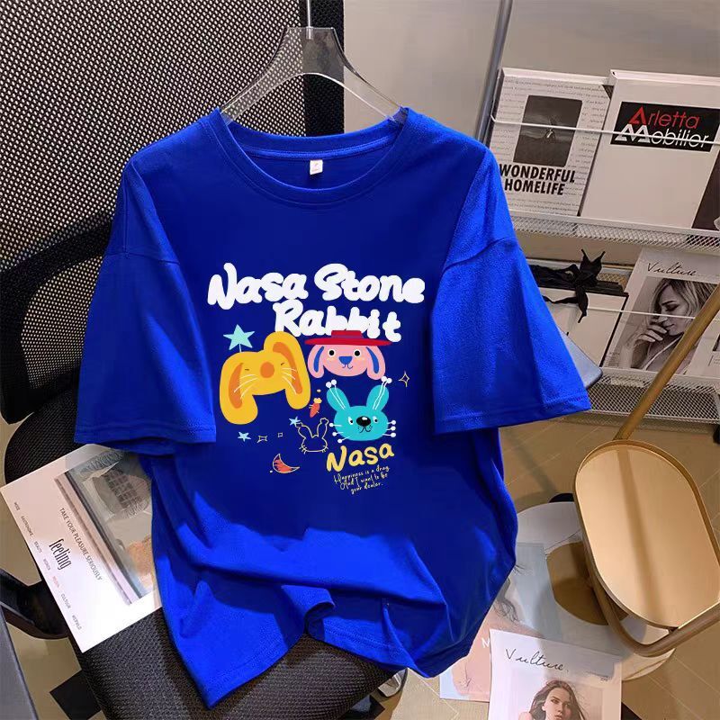 2025 white loose short sleeved women's T-shirt new pure cotton cartoon design European plus size half sleeved top new designer T-shirt