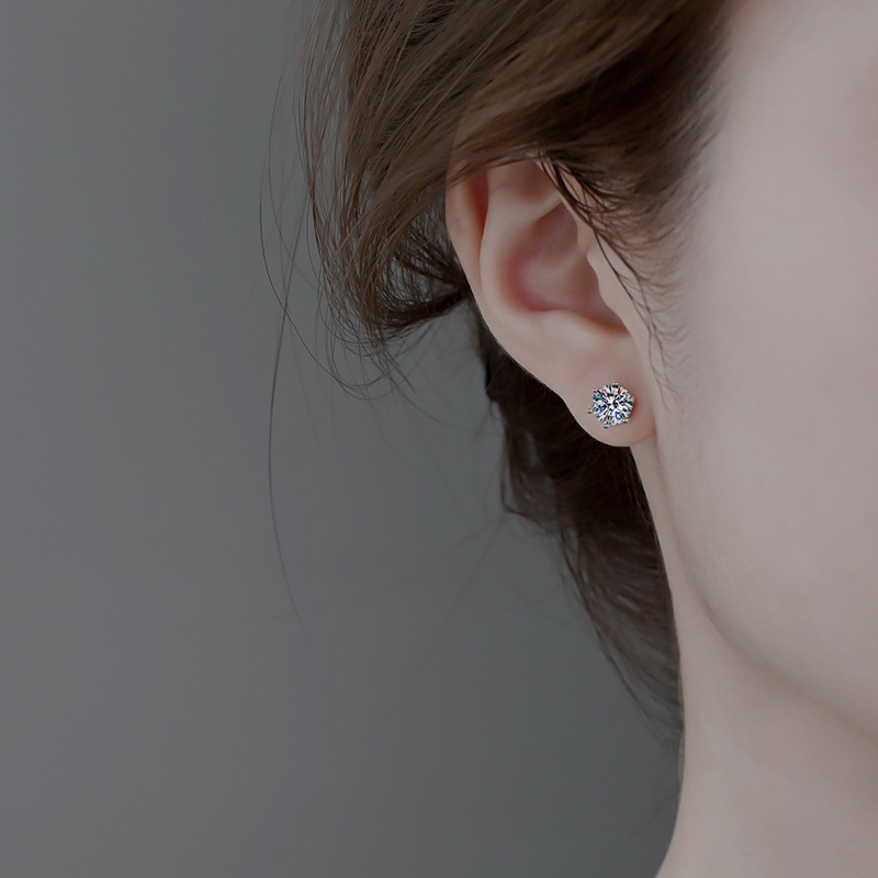 Designer's popular moissanite earrings with a stylish and elegant classic six-claw design for women. The ear jewelry is made of 925 sterling silv