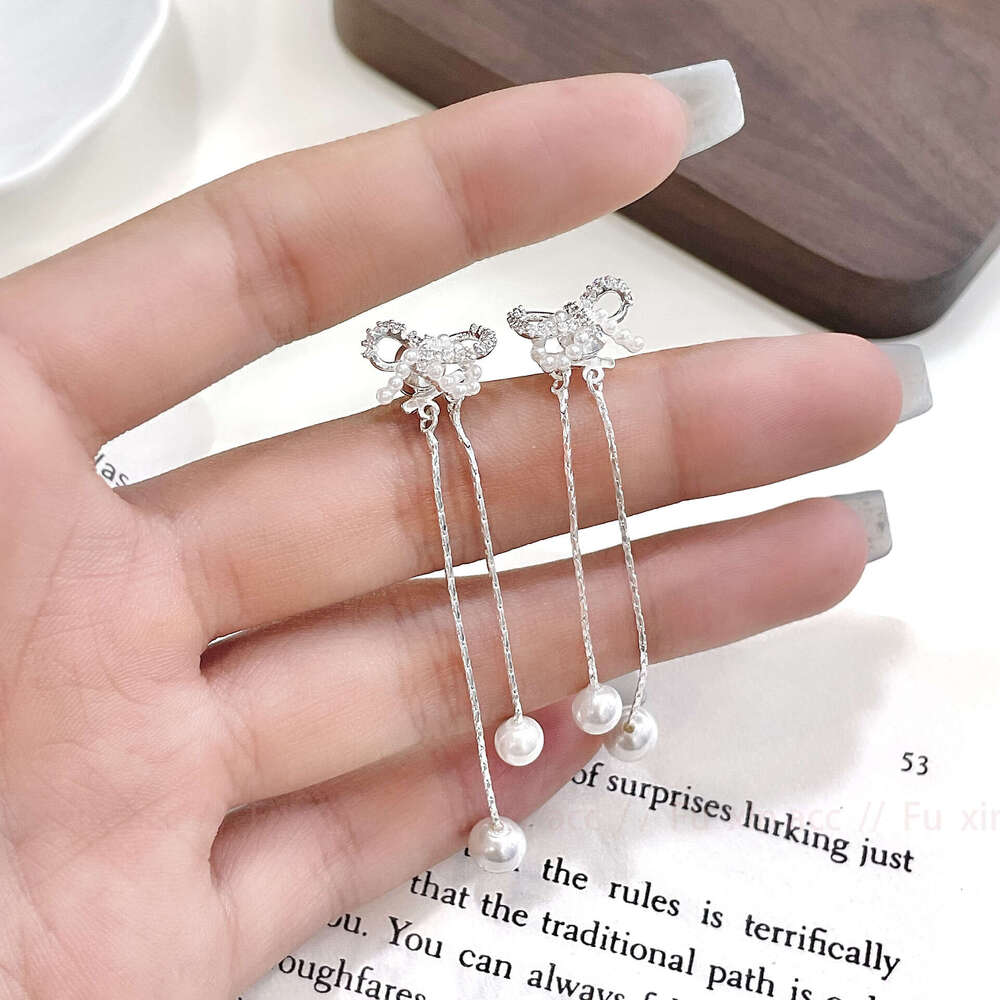 S Sier Needle Bowknot Tassel Sweet Cool Spicy Girl Social Details Artistic White Moonlight Holy Simple Women's Earrings 8e2