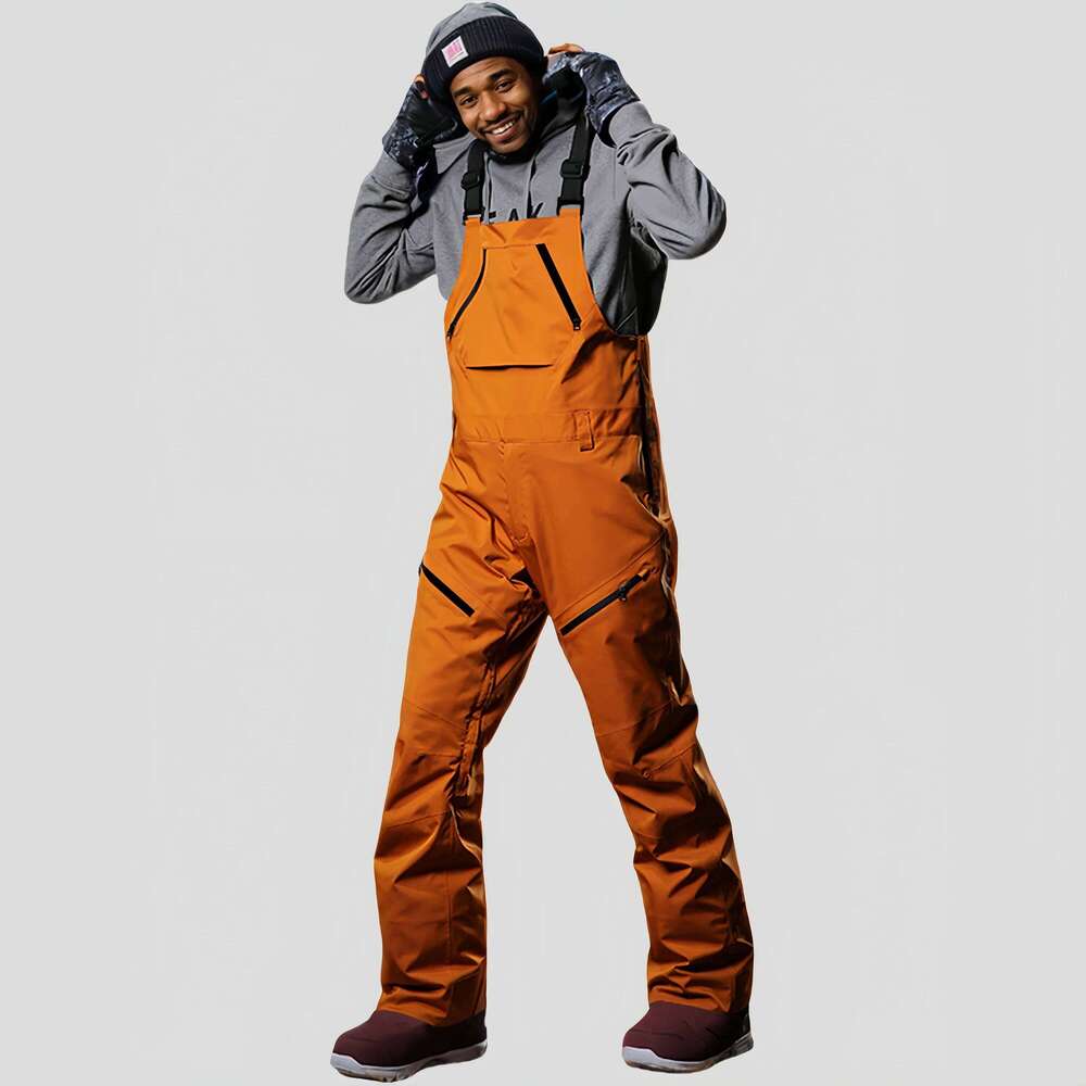 Winter New Skiing Men Loose Ski Overalls Outdoor Waterproof Windproof Snow Trousers Snowboard Sport Strap Pants Clothing