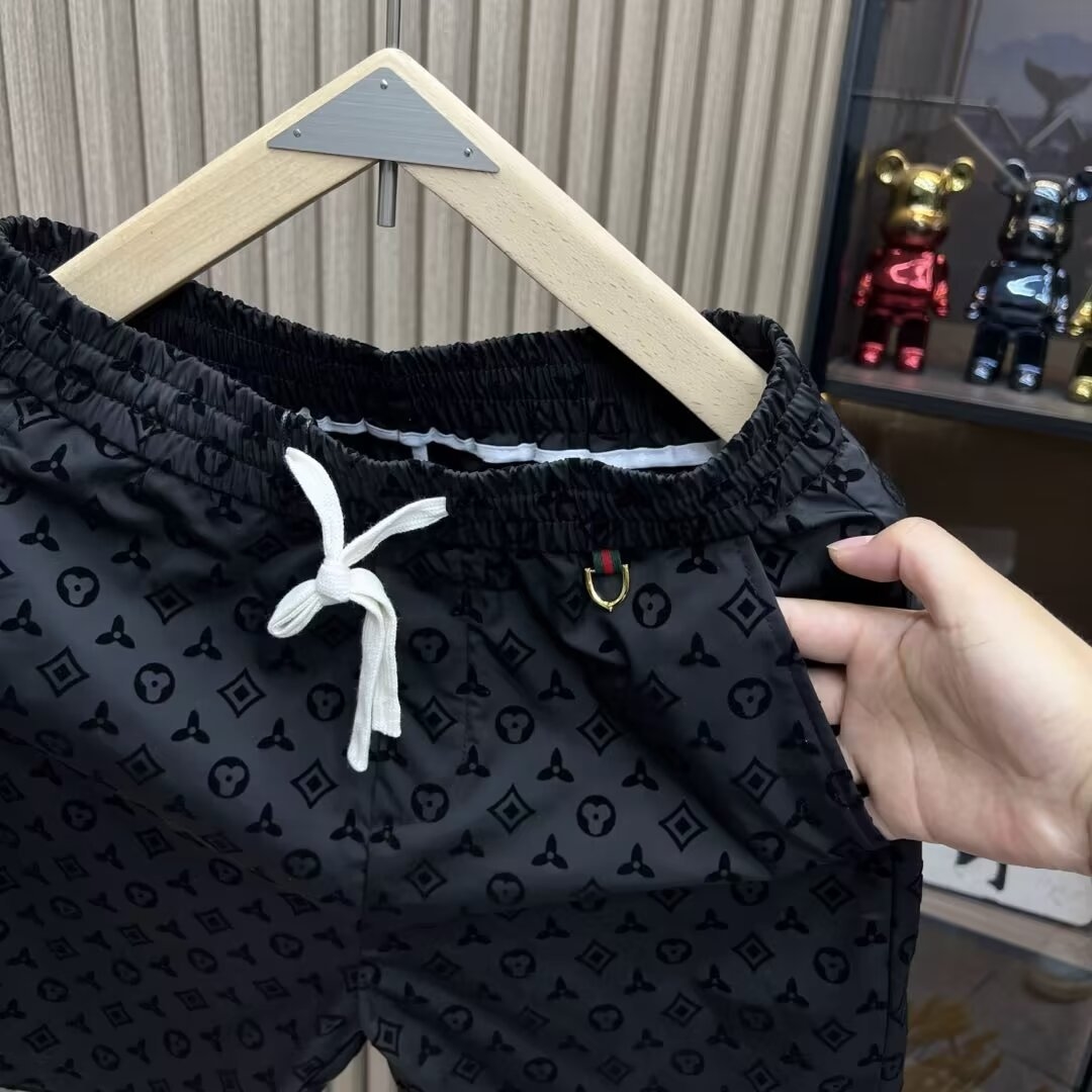 Free shipping summer new men's casual pants wear quick drying handsome breathable straight leg five quarter pants Fashion thin beach pants black