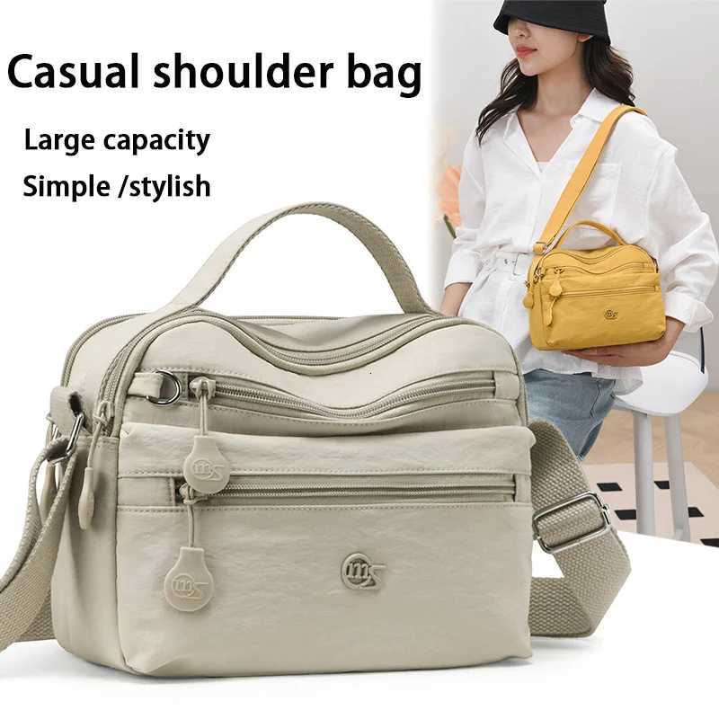 Temus Bestselling Womens Casual Shoulder Bag Largecapacity Casual Multilayer Crossbody Bag Nylon Commuter Womens HandbagW251101