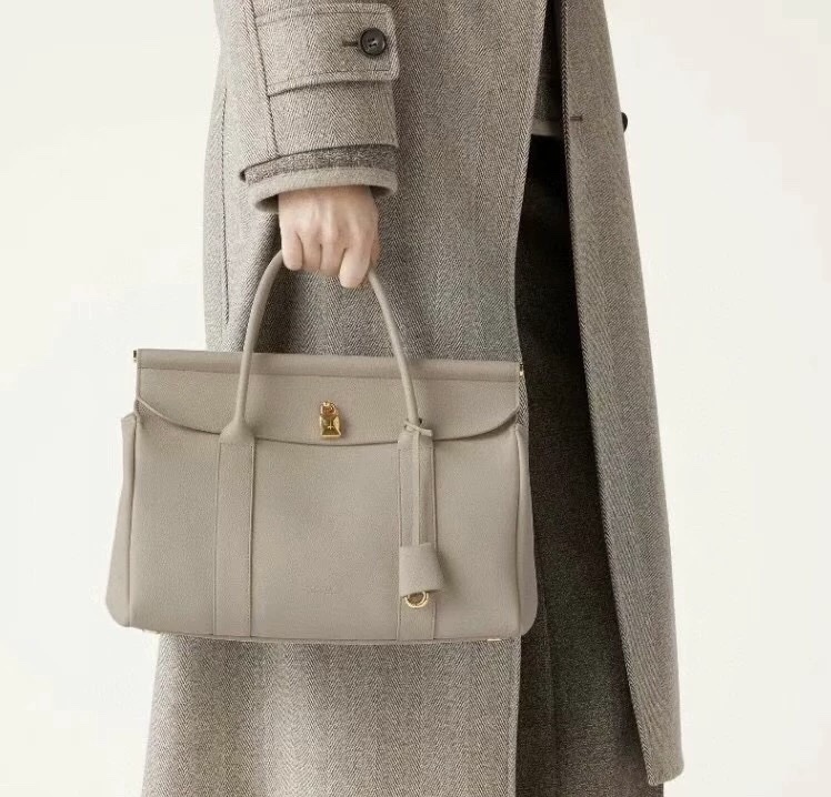 Women's Portable Cowhide Large-Capacity Tote With Single Shoulder Strap & Spacious Design