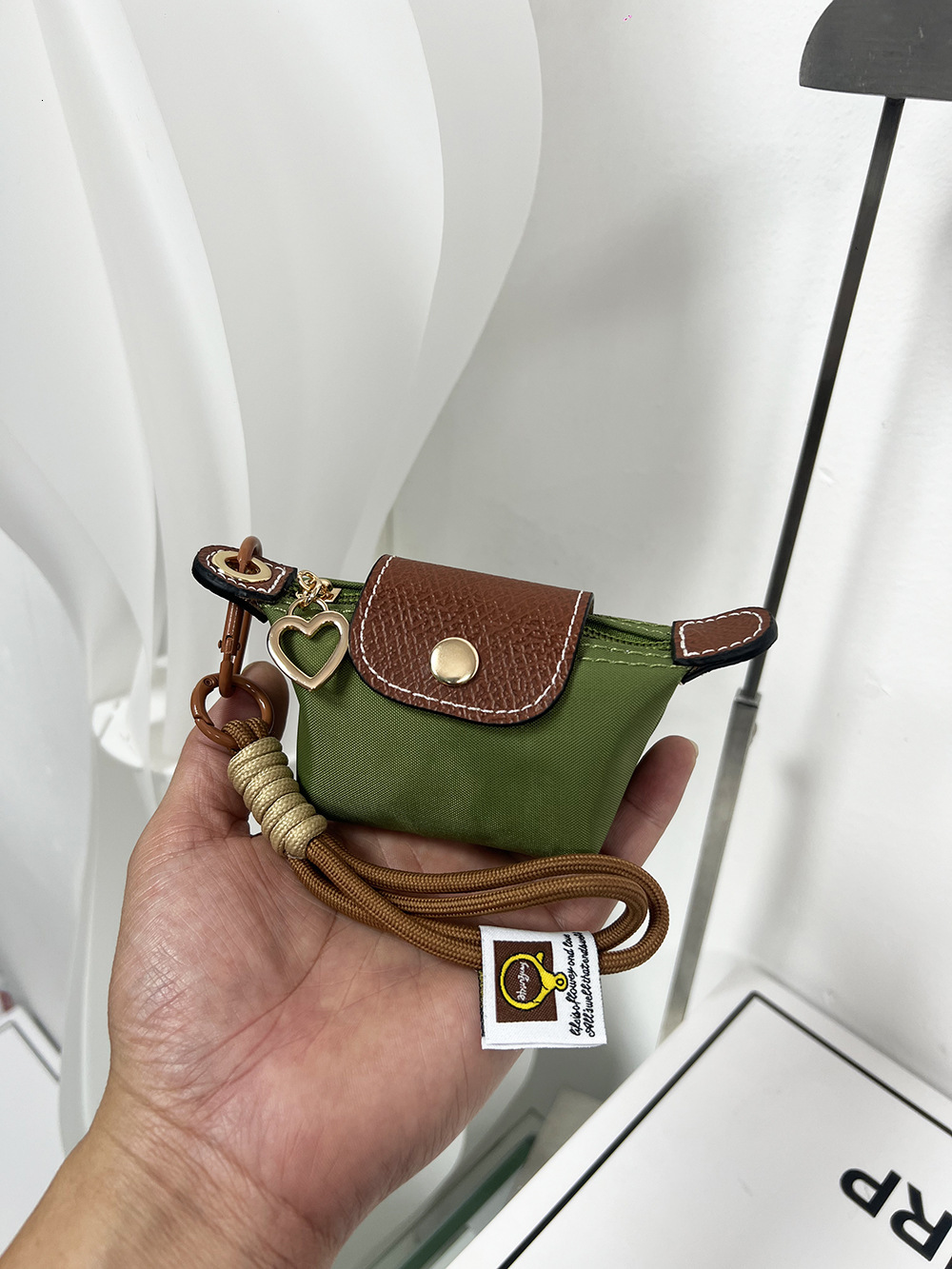 2025S New Model Super Mini Dumpg Bun New French Nylon Leather Change Earphones Lipstick Key Small Pendant Bag