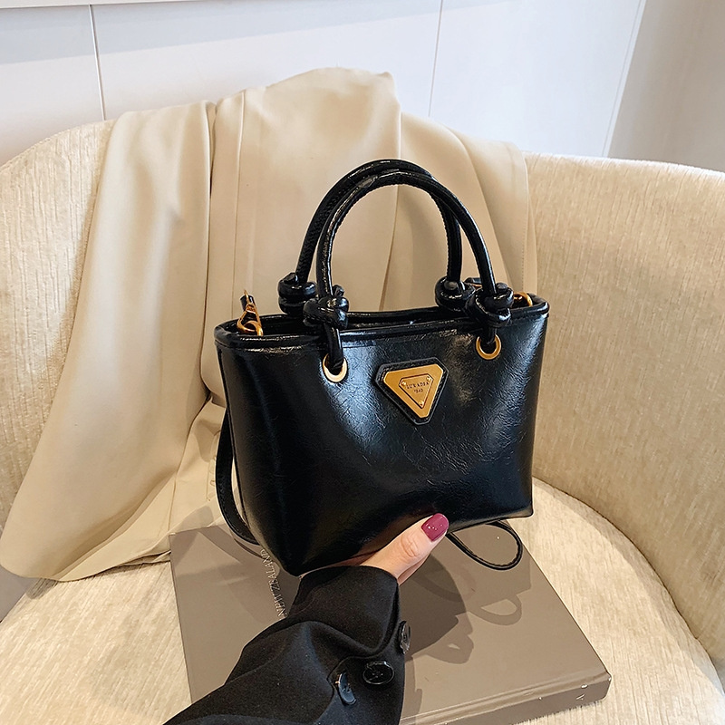 Designer bag free shipping 2025 new women's fashionable hand-held bucket bag shoulder bag crossbody bag