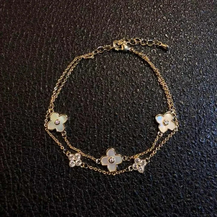 Gold Toned Multi Layered Clover Bracelet With Mother Of Pearl And Rhinestone Details Delicate Daily And Elegant Jewelry Gift For Her High Quality Styl