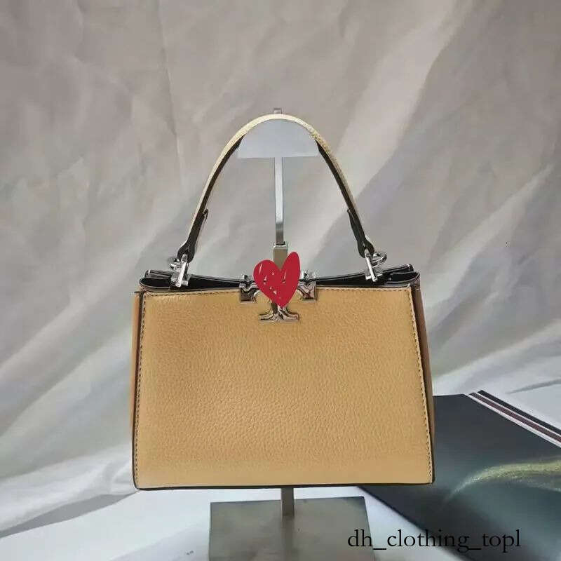 2025 Designer Bag tory Luxury bag Fashion understated elegance Handbag Shoulder bags metal chain bag Handbag Genuine Leather bag cover tori Fashion shoulder bag 48d