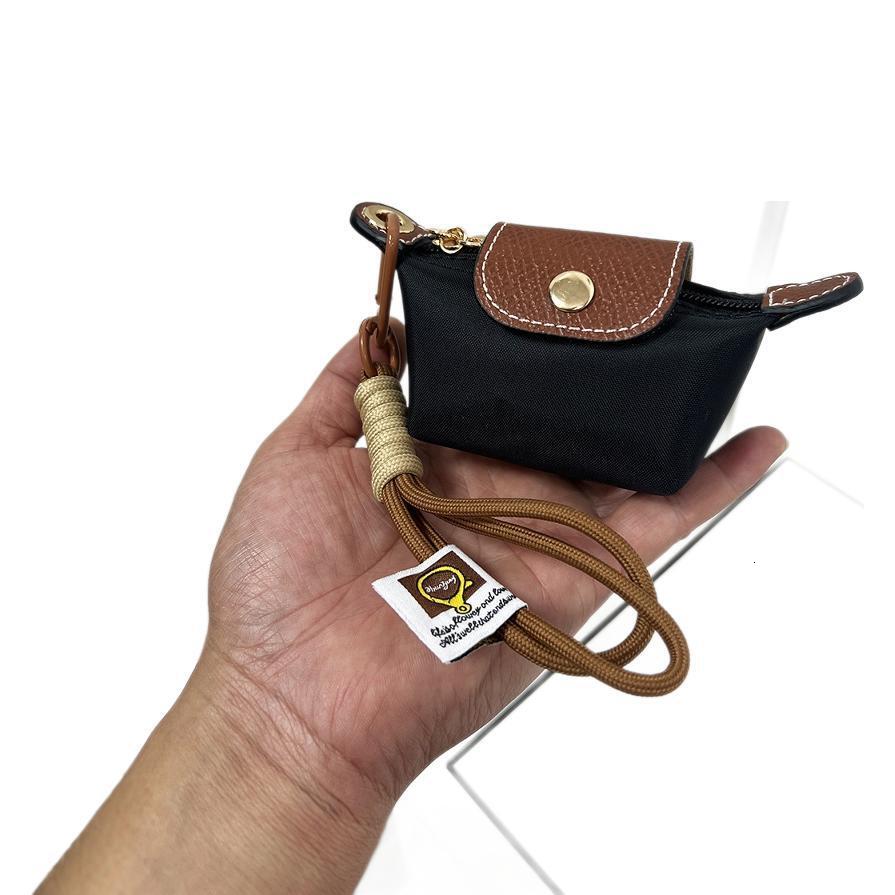 2025S New Model Super Mini Dumpg Bun New French Nylon Leather Change Earphones Lipstick Key Small Pendant Bag
