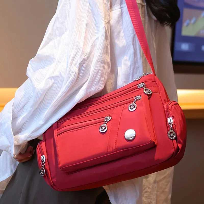 New unisex nylon cloth womens handbag Oxford cloth casual bag shoulder strap crossbody bag travel bagW251101