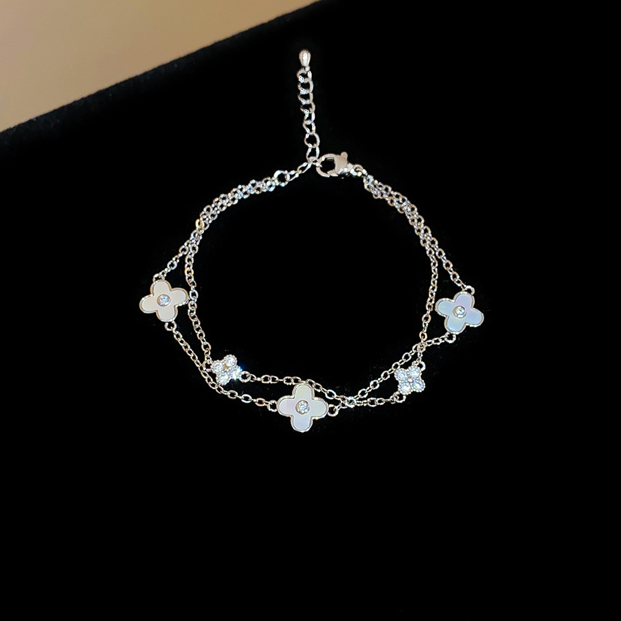Gold Toned Multi Layered Clover Bracelet With Mother Of Pearl And Rhinestone Details Delicate Daily And Elegant Jewelry Gift For Her High Quality Styl