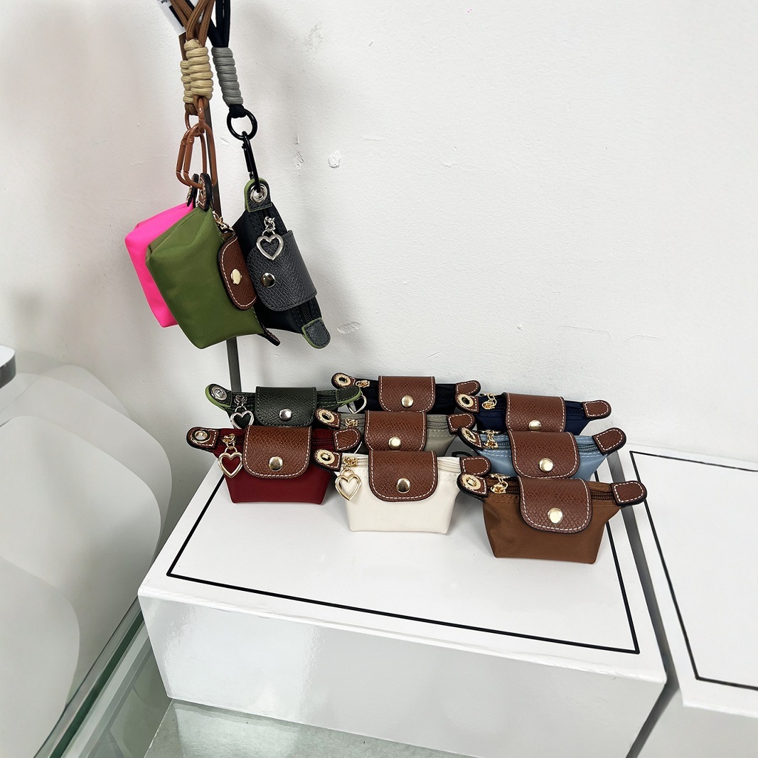 2025S New Model Super Mini Dumpg Bun New French Nylon Leather Change Earphones Lipstick Key Small Pendant Bag