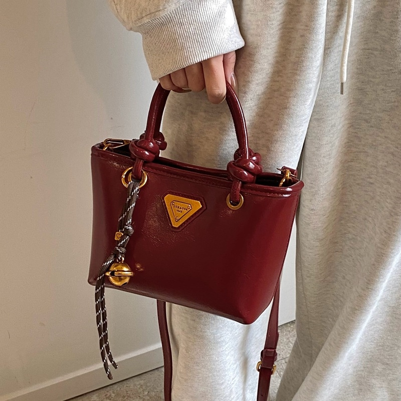 Designer bag free shipping 2025 new women's fashionable hand-held bucket bag shoulder bag crossbody bag