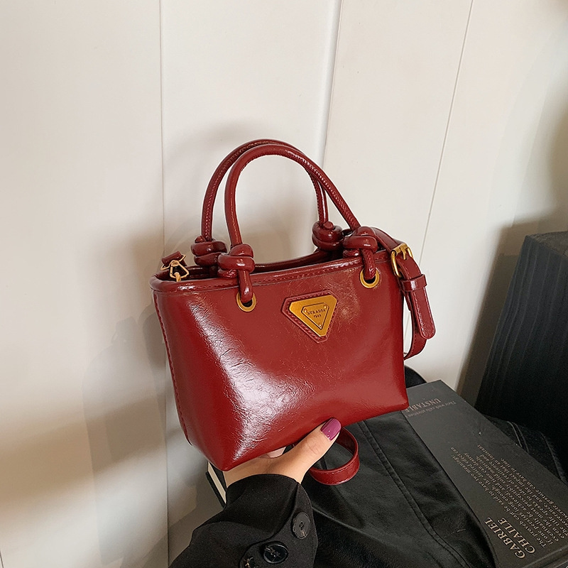 Designer bag free shipping 2025 new women's fashionable hand-held bucket bag shoulder bag crossbody bag
