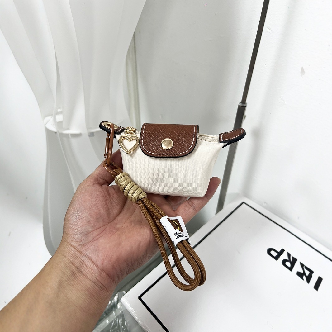 2025S New Model Super Mini Dumpg Bun New French Nylon Leather Change Earphones Lipstick Key Small Pendant Bag
