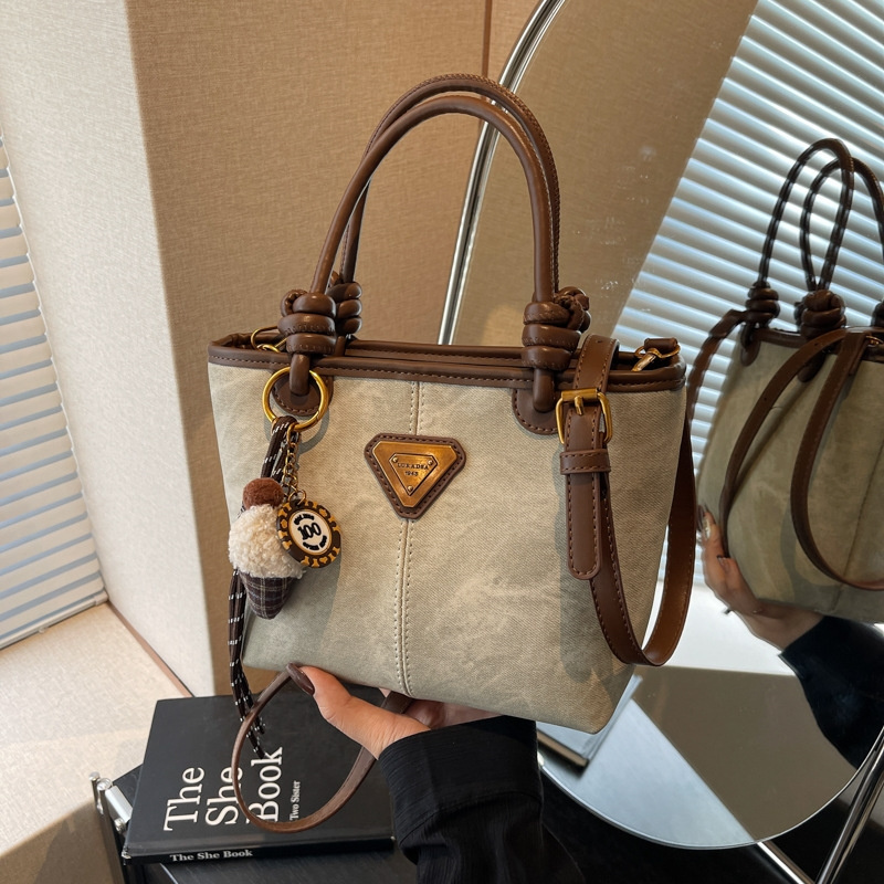Designer Free Shipping 2025 New Women's Fashion Commuting High-end Hand-held Bucket Shoulder Crossbody Bag New Free Delivery Designer Bag
