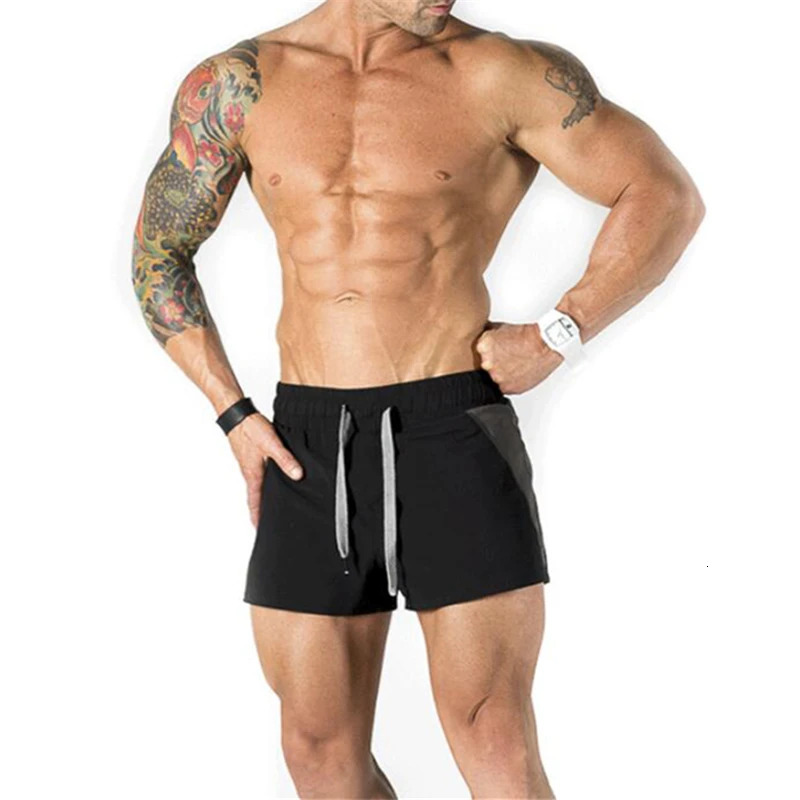 Muscle mens summer beach shorts gym fitness and bodybuilding breathable fast drying sports casual jogging 250402m