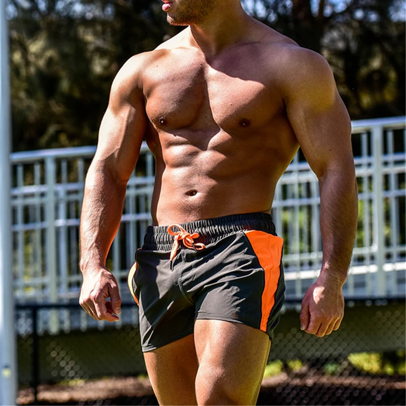Muscle mens summer beach shorts gym fitness and bodybuilding breathable fast drying sports casual jogging 250402m