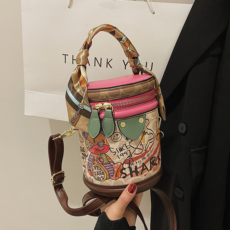 Free shipping bucket bag Women's new women's temperament graffiti cylindrical everything stylish single shoulder crossbody bag 2025