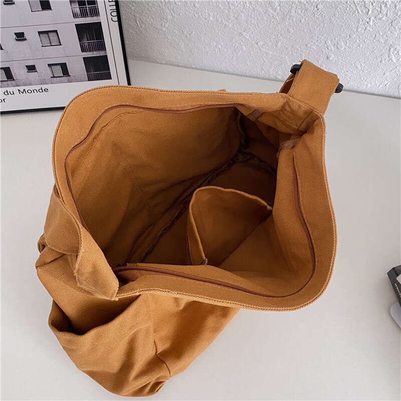 2025 NEW Work style single shoulder crossbody men and women ins canvas for students, school bag, street large capacity artistic leisure bag