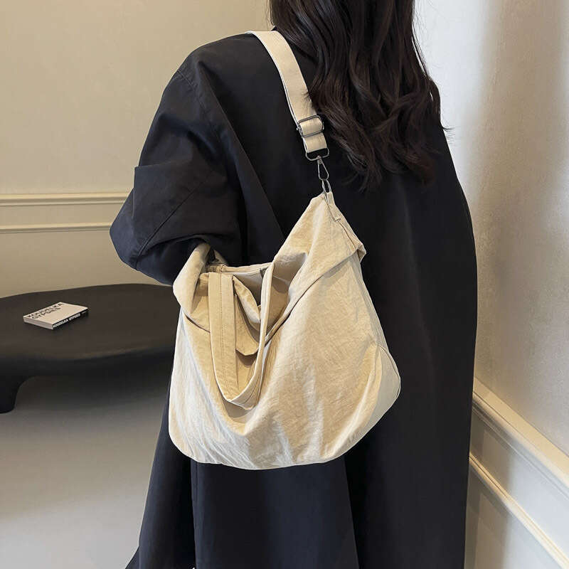 2025 NEW Korean version nylon cloth bucket women's handheld versatile large bag, internet famous, same style, stylish single shoulder crossbody b