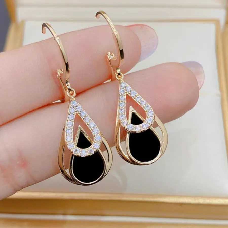 Fashionable rhinestone black enamel oil drop pendant earrings suitable for womens parties gold hollow circular jewelry gift Y250401