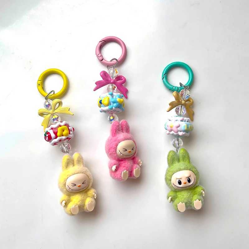 Mini Labubu keychain cartoon creative 3D doll student backpack pendant car keychain womens display 2025 W250402