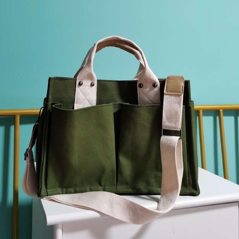 2025 NEW Canvas for women, Korean version, simple and fashionable handbag, ins, artistic style, multiple pockets, women's personalized one should