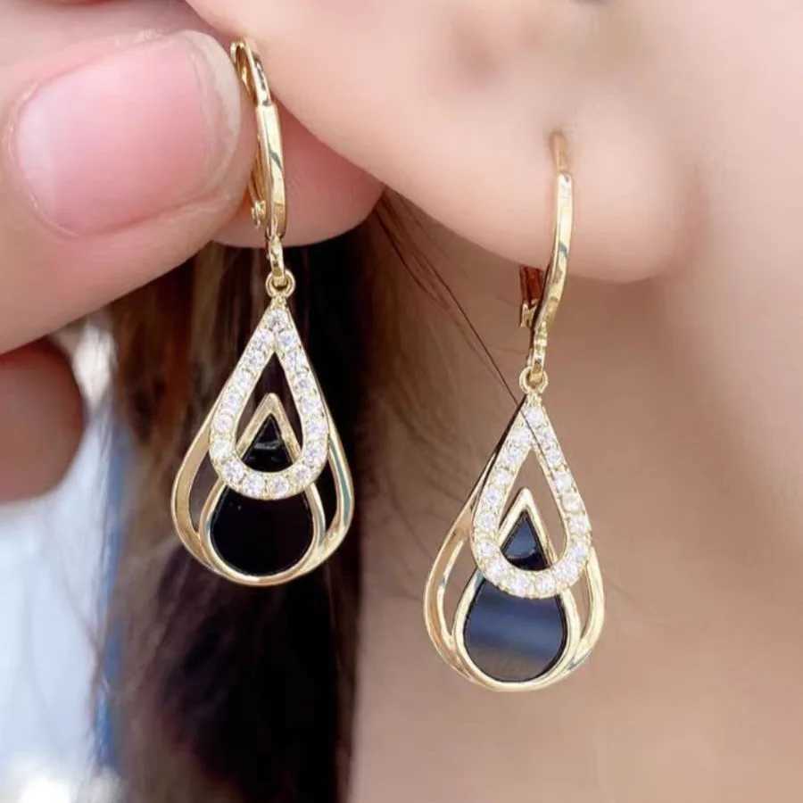 Fashionable rhinestone black enamel oil drop pendant earrings suitable for womens parties gold hollow circular jewelry gift Y250401