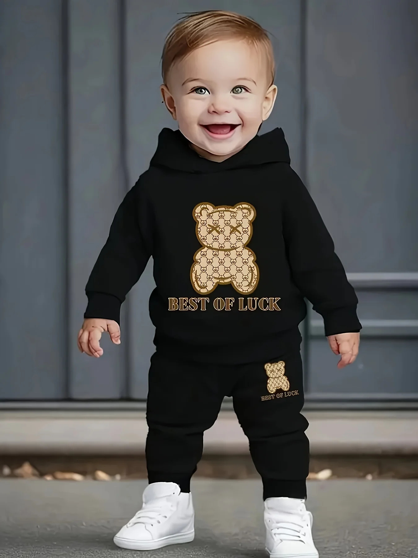 A twopiece cartoon printed fleece hoodie and long pants set for a born baby boy in autumn and winter 251027