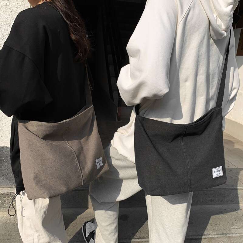 2025 NEW Canvas men's crossbody, Korean version, new student shoulder bag, large capacity, original style, portable backpack, women's versat