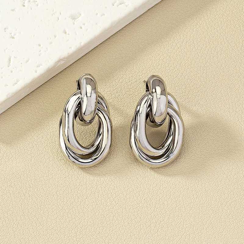 Double layered twisted hollow geometric metal stud earrings suitable for womens hip-hop personality silver jewelry Christmas girl gift Y250401