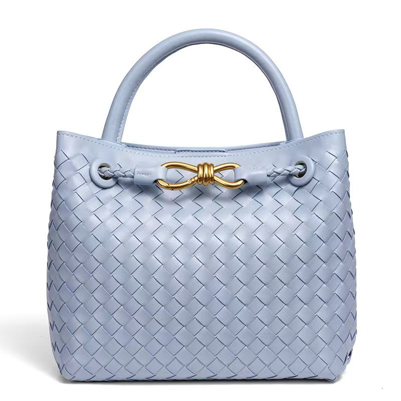 New fashionable women s bag with bow bag hand woven handbag trendy handheld shoulder width design European and American style designer bag