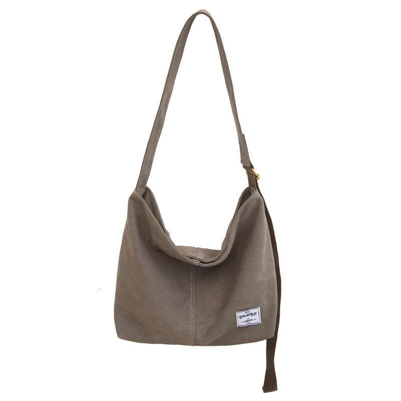 2025 NEW Canvas men's crossbody, Korean version, new student shoulder bag, large capacity, original style, portable backpack, women's versat