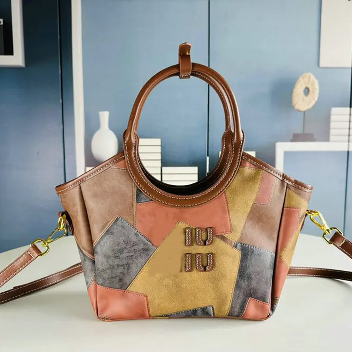 Designer womens leisure handbag outdoor travel fashion shoulder bag highquality genuine leather large capacity crossbody bag classic bestselling style EB1050