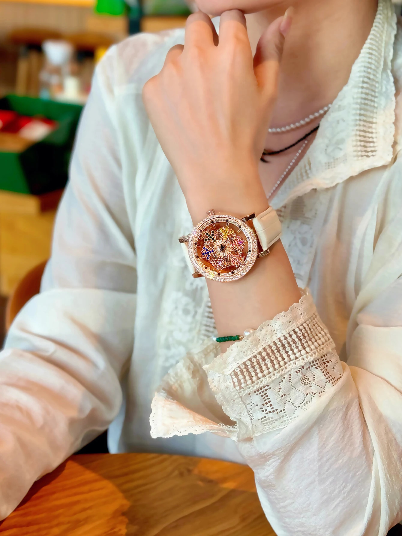 1 Upgraded Version of the Bright EyeCatching Fashionable Womens Watch Inlaid with Colorful Rhinestone Quartz Watch Equipped with Charming Rotating Col