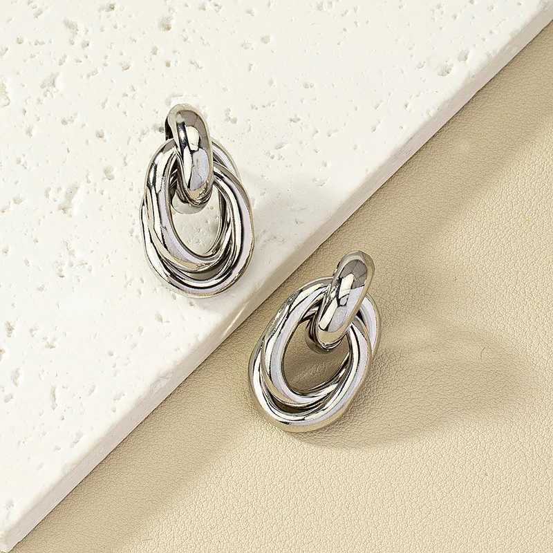Double layered twisted hollow geometric metal stud earrings suitable for womens hip-hop personality silver jewelry Christmas girl gift Y250401