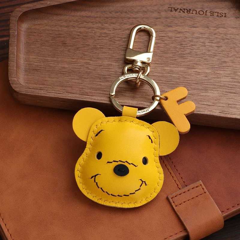 Handmadereal sheepskinWinnie the Pooh keychain cute bear couple doll bag pendant Bagcharm X250402