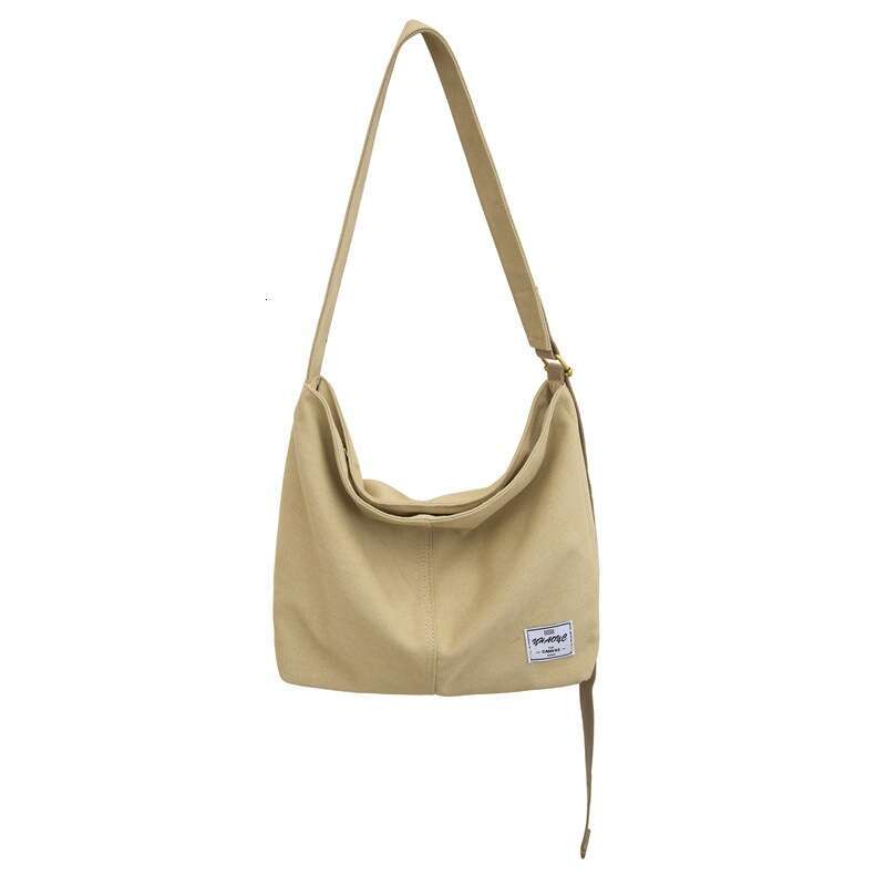 2025 NEW Canvas men's crossbody, Korean version, new student shoulder bag, large capacity, original style, portable backpack, women's versat