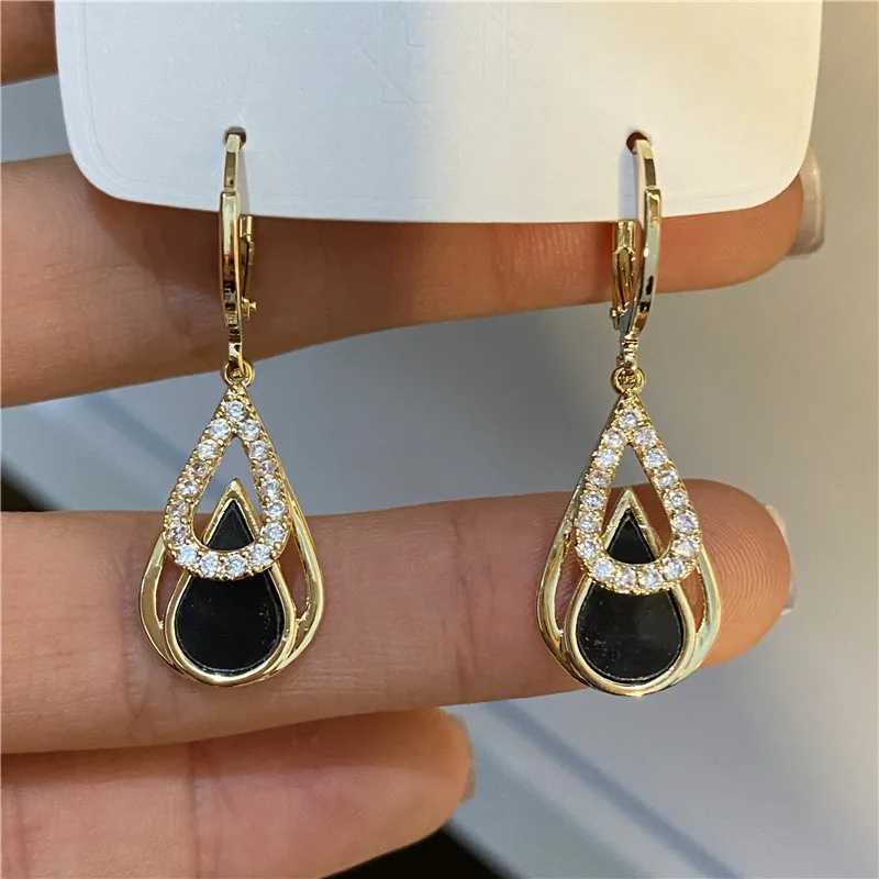 Fashionable rhinestone black enamel oil drop pendant earrings suitable for womens parties gold hollow circular jewelry gift Y250401