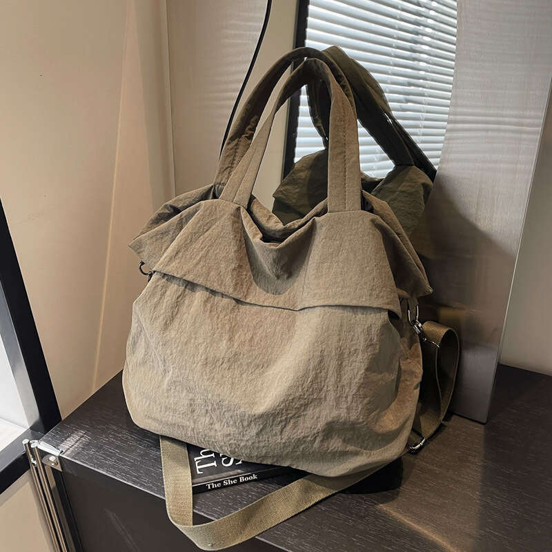 2025 NEW Korean version nylon cloth bucket women's handheld versatile large bag, internet famous, same style, stylish single shoulder crossbody b