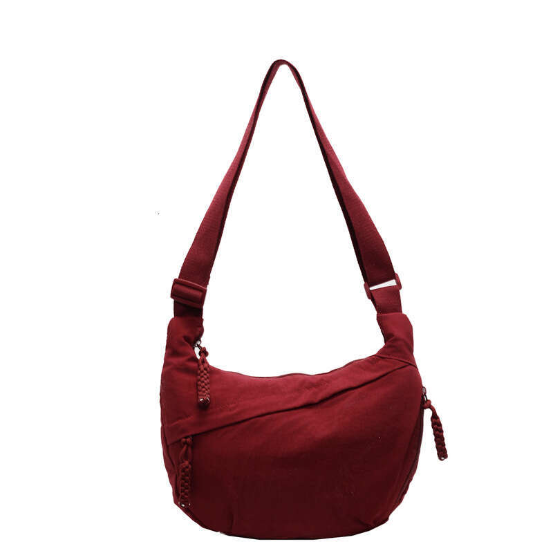 2025 NEW Female student fashion class crossbody nylon cloth large capacity shoulder solid color simple and versatile travel dumpling bag